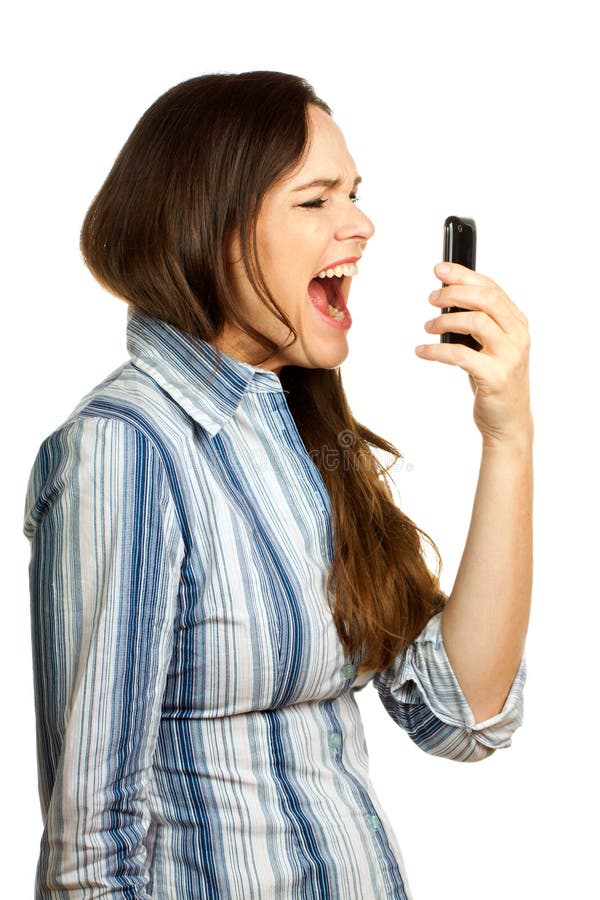 Gefrustreerde bedrijfsvrouw die bij haar telefoon schreeuwt stock fotografie Gefrustreerde bedrijfsvrouw die bij haar telefoon schreeuwt stock fotografie