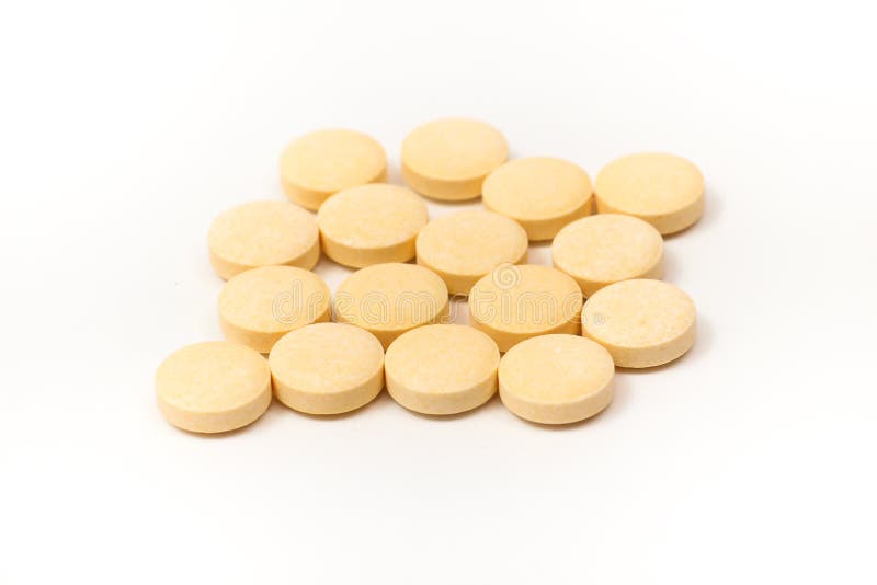 Gelbe Tabletten Mit Dem Weißen Hintergrund Stockbild Bild von schaden