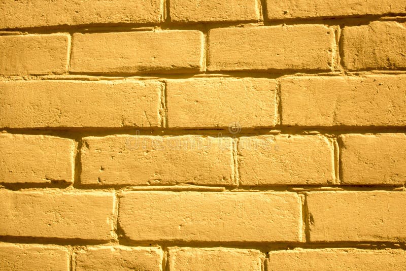 Gelber Backsteinmauerhintergrund f?r Designer stockfotos Gelber Backsteinmauerhintergrund f?r Designer stockfotos