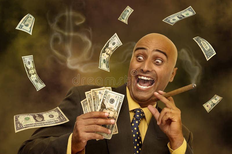 Businessman with dollars flying all around. Businessman with dollars flying all around
