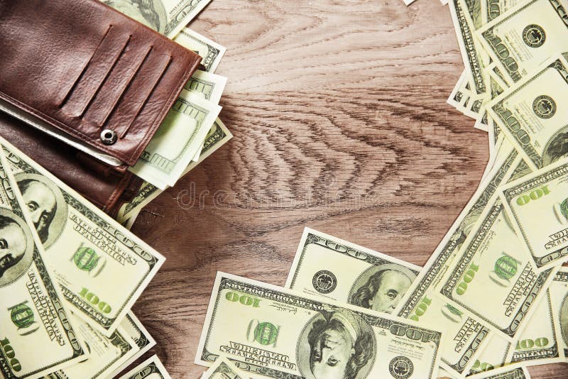 Geldbörse und Banknoten von Dollar lizenzfreie stockfotos Geldbörse und Banknoten von Dollar lizenzfreie stockfotos