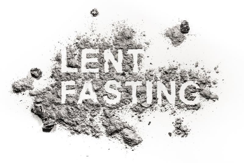 Lent fasting word written in ash, sand or dust as forty days abstinence period time before easter as redemption or penance jesus in desert concept. Lent fasting word written in ash, sand or dust as forty days abstinence period time before easter as redemption or penance jesus in desert concept