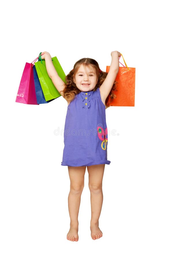 Gelukkig kind dat van giften en vakantie geniet royalty-vrije stock afbeeldingen Gelukkig kind dat van giften en vakantie geniet royalty-vrije stock afbeeldingen