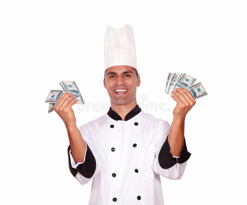 Portrait of a happy male in cook uniform holding money on white background. Portrait of a happy male in cook uniform holding money on white background