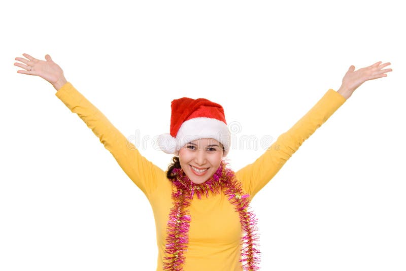 A happy asian girl in santa's hat, isolated on white. A happy asian girl in santa's hat, isolated on white