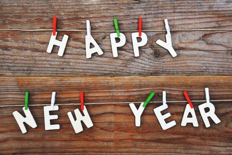 Happy new year on wooden background. Happy new year on wooden background