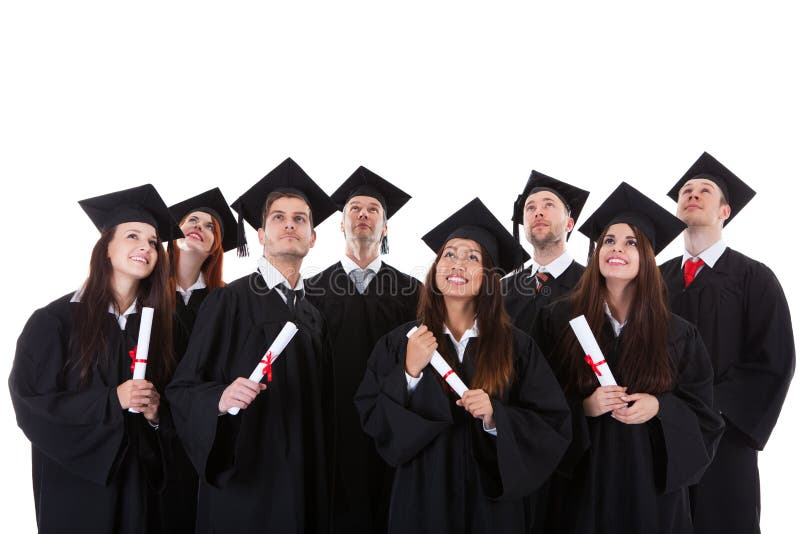 Happy smiling group of multiethnic graduates dressed in black academic gowns and mortarboard hats standing grouped close together with their certificates isolated on white. Happy smiling group of multiethnic graduates dressed in black academic gowns and mortarboard hats standing grouped close together with their certificates isolated on white
