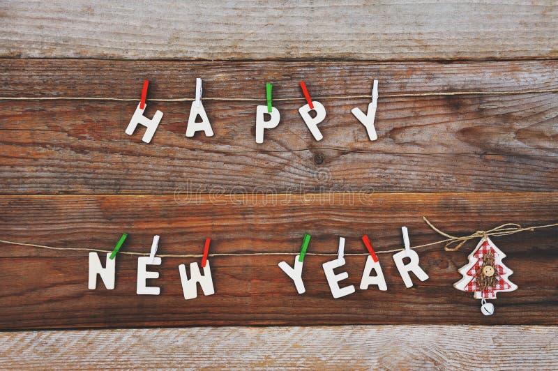 Happy new year and christmas tree decoration on wooden background. Happy new year and christmas tree decoration on wooden background