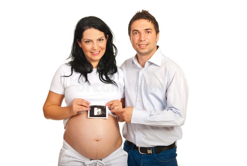 Gelukkige ouders die baby houden sonogram stock afbeelding Gelukkige ouders die baby houden sonogram stock afbeelding