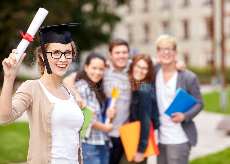 Education, campus, friendship, graduation and people concept - group of happy teenage students with diploma school folders. Education, campus, friendship, graduation and people concept - group of happy teenage students with diploma school folders