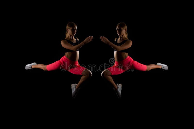 Frozen in motion. Reflection woman athlete run jump fly. How run faster. Speed training guide. Improve run speed. Girl runner on black background. Sport lifestyle and health concept. Start run. Frozen in motion. Reflection woman athlete run jump fly. How run faster. Speed training guide. Improve run speed. Girl runner on black background. Sport lifestyle and health concept. Start run.