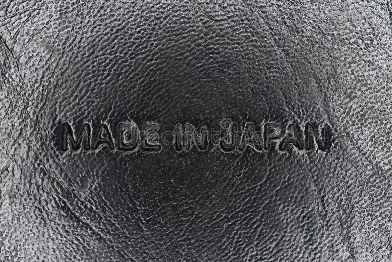 Made in Japan stamped lettering on product packaging. Made in Japan stamped lettering on product packaging.