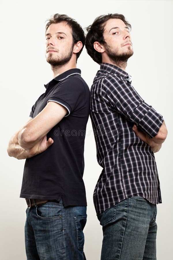 Gemelos confidentes fotografía de archivo Gemelos confidentes fotografía de archivo
