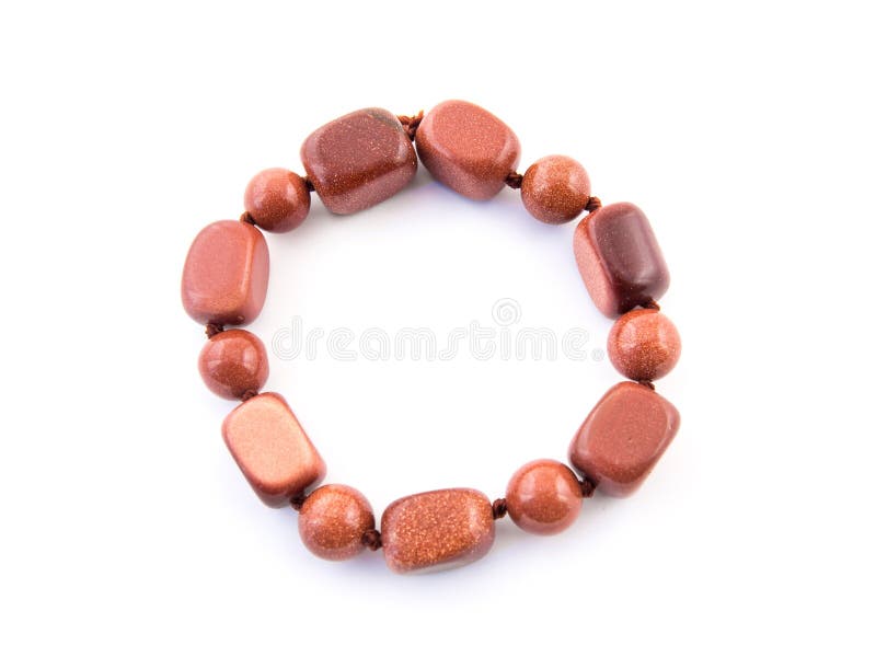 Gemme minérale Aventurine brun orange d'isolement sur le fond blanc image libre de droits Gemme minérale Aventurine brun orange d'isolement sur le fond blanc image libre de droits