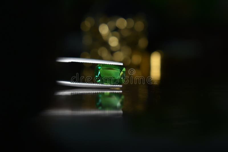 Gems and jewelry are A beautiful green gemstone for making elegant royalty free stock photo