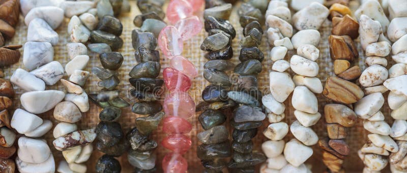 A close-up of gemstone bracelets.