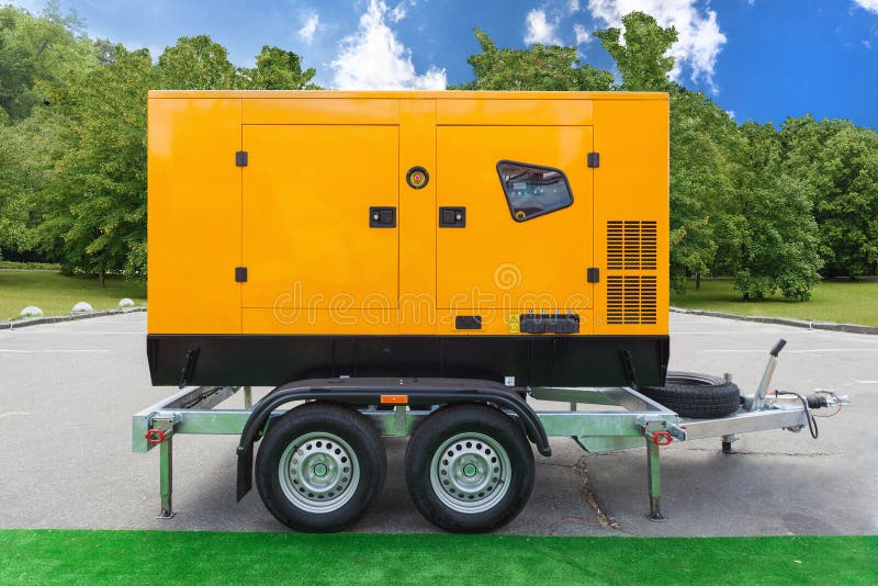 Generador diesel móvil de la carga para la energía eléctrica de la emergencia que se coloca exterior contra árboles verdes y el c imágenes de archivo libres de regalías Generador diesel móvil de la carga para la energía eléctrica de la emergencia que se coloca exterior contra árboles verdes y el c imágenes de archivo libres de regalías
