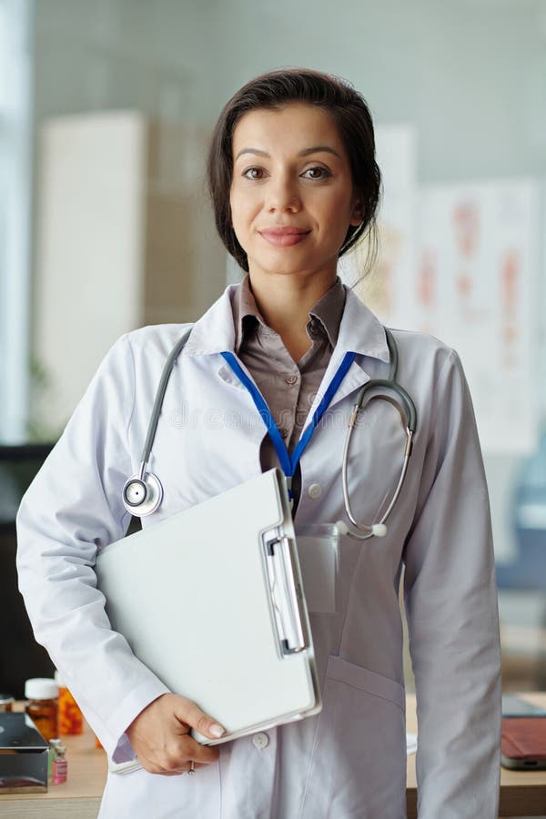 General Practitioner with Clipboard Stock Image Image of doctor
