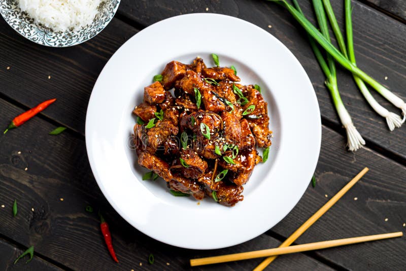 General Tso`s Chicken closeup view from above. General Tso`s chicken also tsao or tao is a popular chinese restaurant food with deep-fried crispy chicken royalty free stock image