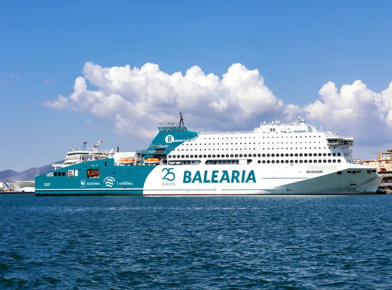 SPAIN, MALAGA, MAY, 28, 2023: Fast ferry Balearia in Malaga port, Spain. Balearia is the leading shipping company for passenger and cargo transport, with connections to the Balearic Islands