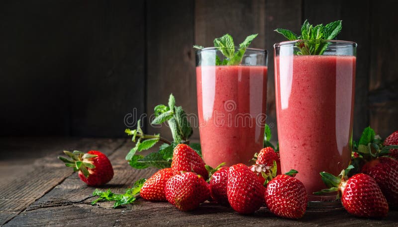 Strawberry and mint smoothie in tall glasses, bawl of fresh berries on dark rustic wood background. Selective focus, copy space. Ai generated image