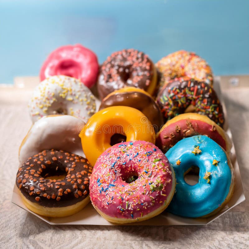 Colorful donuts. Assortiment of donuts with various colors and toppings. royalty free illustration