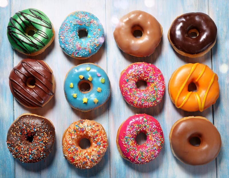 Colorful donuts. Assortiment of donuts with various colors and toppings. stock illustration