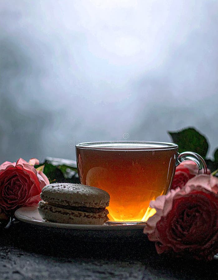 Cup of tea and roses. Closeup of cup of tea with cake and roses. Al Generated. Candy flower cup illustrations