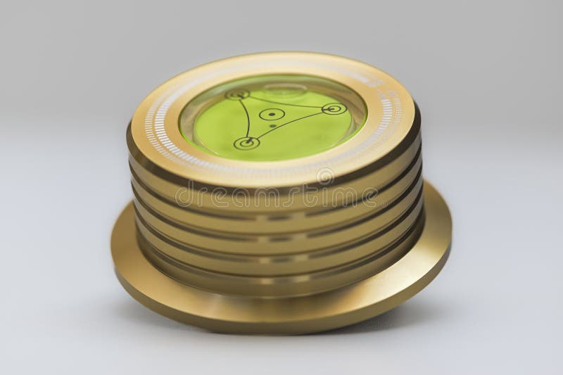 Precision Bullseye Spirit Level with Gold Anodized Aluminum Housing for Tripod or Turntable Alignment, Macro Close-Up stock photo
