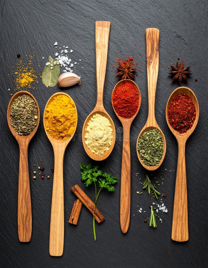 Spices- Curry- Chilli- Cinnamon- Curcuma- Garlic- Parsley- Oregano- Salt and Pepper stock illustration