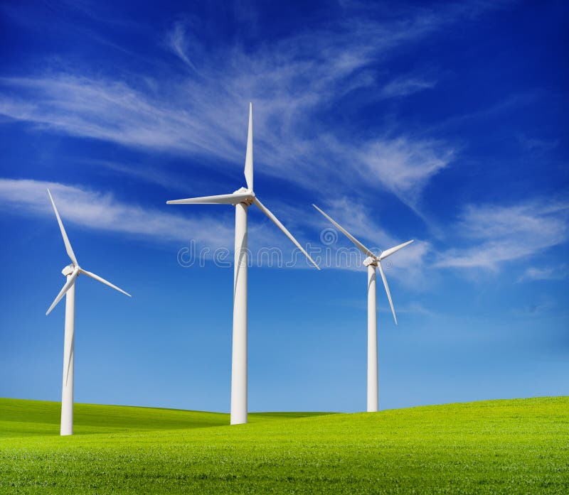 Generatori eolici nelle colline verdi immagine stock libera da diritti Generatori eolici nelle colline verdi immagine stock libera da diritti