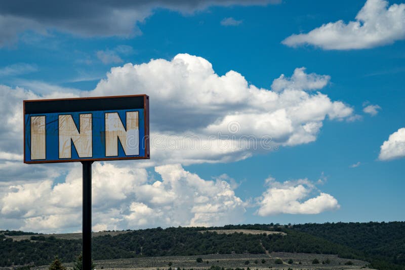 Generic sign for an abandoned Inn motel or hotel. Copyspace available