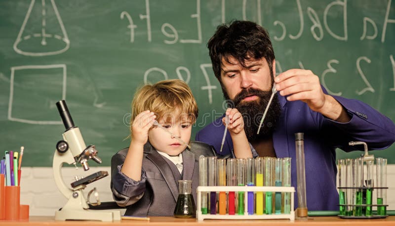 Genius kid. Teacher child test tubes. Chemical experiment. Achieving developmental milestones way before predicted sign that child ready to be challenged. Genius minds. Genius toddler private lesson. Genius kid. Teacher child test tubes. Chemical experiment. Achieving developmental milestones way before predicted sign that child ready to be challenged. Genius minds. Genius toddler private lesson.