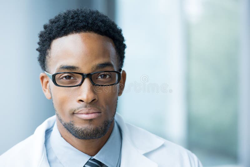 Closeup portrait head shot of friendly, smiling confident male doctor, healthcare professional with a white coat, black glasses, isolated hospital clinic background. Closeup portrait head shot of friendly, smiling confident male doctor, healthcare professional with a white coat, black glasses, isolated hospital clinic background.