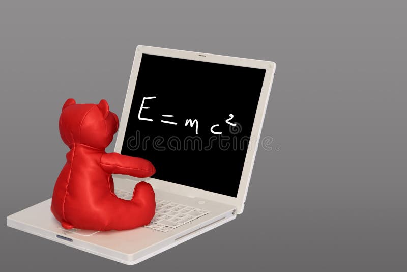 Červené teddybear sedí na přenosném počítači, učení theorie relativity.