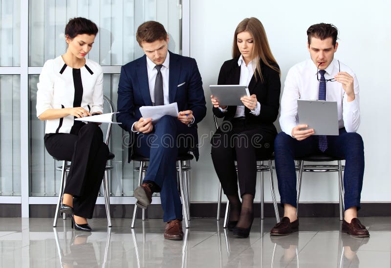 Gens d'affaires attendant l'entrevue d'emploi images libres de droits