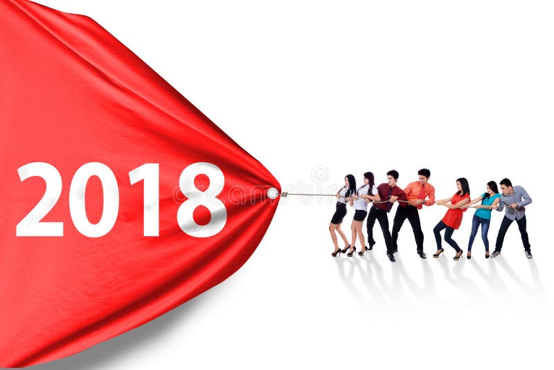 Gens d'affaires tirant les numéros 2018 sur le studio photos stock Gens d'affaires tirant les numéros 2018 sur le studio photos stock