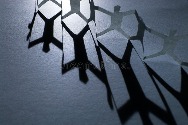 Gente Chain di carta fotografia stock libera da diritti Gente Chain di carta fotografia stock libera da diritti