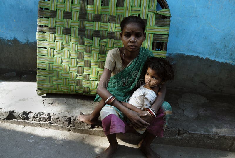 REKHA DEVI & her daughter BINITA always feel bad. They living in a congested slum area of Jharia.REKHA DEVI make a living by picking coal illegally from the mines to sell at local markets. REKHA DEVI & her daughter BINITA always feel bad. They living in a congested slum area of Jharia.REKHA DEVI make a living by picking coal illegally from the mines to sell at local markets.