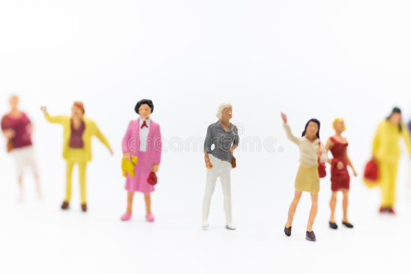Gente miniatura: Gruppo di donne che stanno insieme, usato per annunciare il giorno internazionale del ` s delle donne lavorarici immagini stock libere da diritti Gente miniatura: Gruppo di donne che stanno insieme, usato per annunciare il giorno internazionale del ` s delle donne lavorarici immagini stock libere da diritti