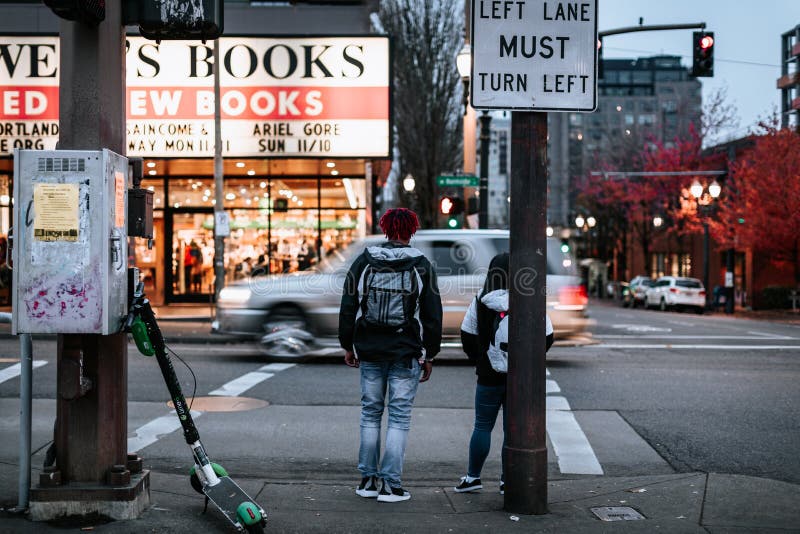Portland, Oregon - Nov 10, 2019 : People going to Powell's Books, where is the worlds largest used and new bookstore. Portland, Oregon - Nov 10, 2019 : People going to Powell's Books, where is the worlds largest used and new bookstore