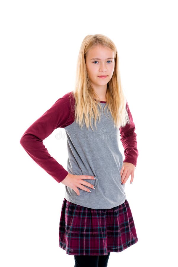 Gentille fille blonde dans la jupe de plaid image stock Gentille fille blonde dans la jupe de plaid image stock