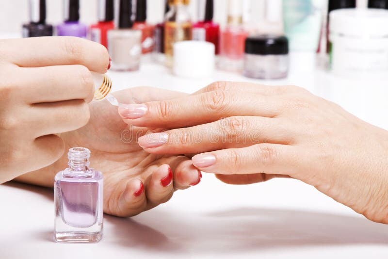 Gentle Care of Nails in a Beauty Salon Stock Photo - Image of polish
