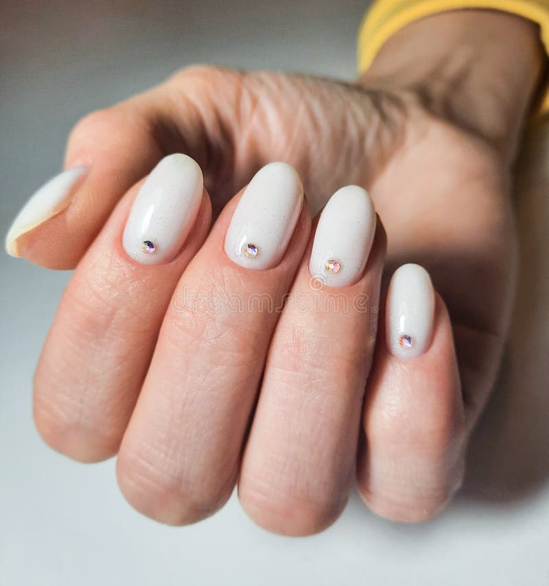 Milk Nails Are Quickly Becoming the Biggest Celebrity Manicure Trend of  2023 | Glamour