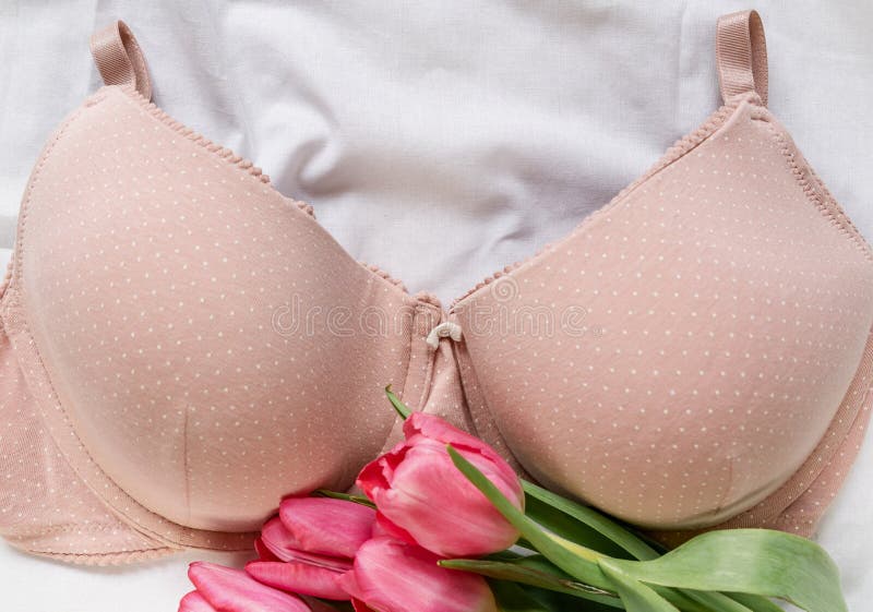 Premium Photo  Close-up of a female breast in lace underwear. bra