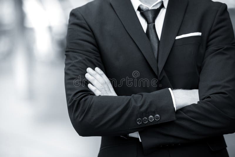 Gentleman business man cross arm vintage black and white