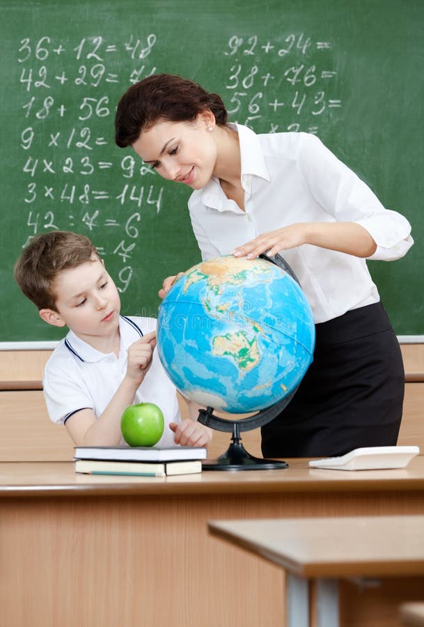 Geography Teacher Shows Something To the Pupil Stock Photo Image of
