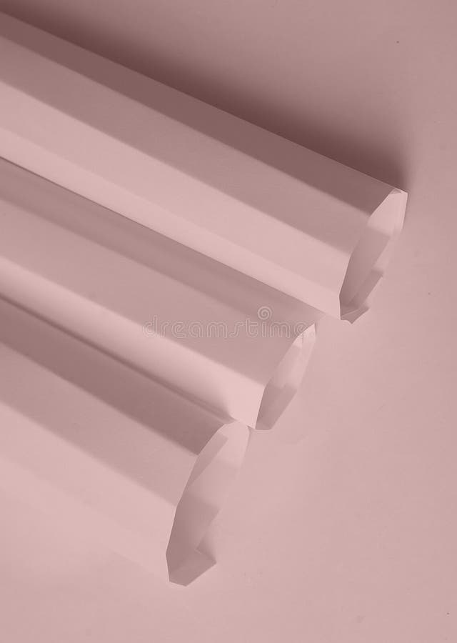 Geometric shapes made of pink corrugated cardboard. Cardboard color shapes stock images, royalty-free photos and pictures