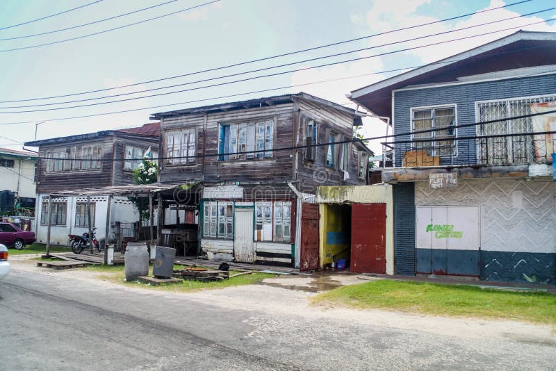 Old wooden houses in Georgetown. GEORGETOWN, GUYANA - AUGUST 10, 2015: Old wooden houses in Georgetown, capital of Guyana royalty free stock image Old wooden houses in Georgetown. GEORGETOWN, GUYANA - AUGUST 10, 2015: Old wooden houses in Georgetown, capital of Guyana royalty free stock image
