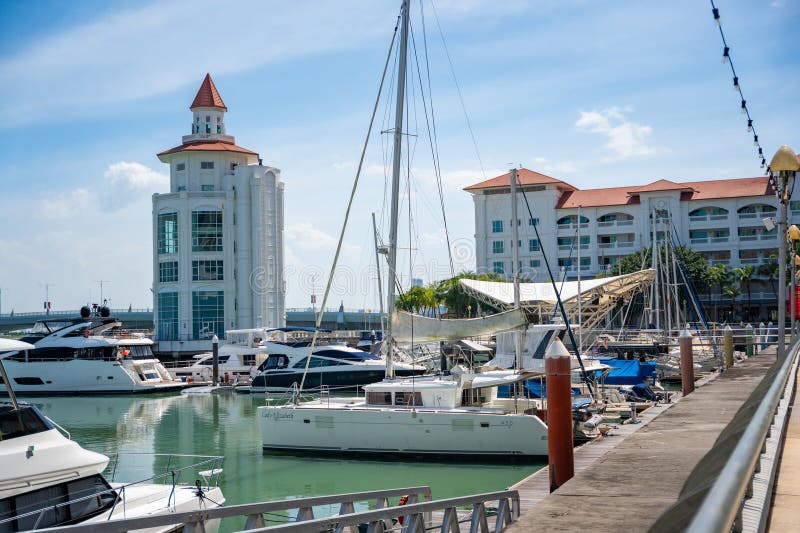 Georgetown, Malaysia - December 18, 2023: Private boat and yacht parking at Strait Quay, Penang. Residential, shopping mall, recreation area and marina located in Tanjung Tokong. High quality photo. Georgetown, Malaysia - December 18, 2023: Private boat and yacht parking at Strait Quay, Penang. Residential, shopping mall, recreation area and marina located in Tanjung Tokong. High quality photo